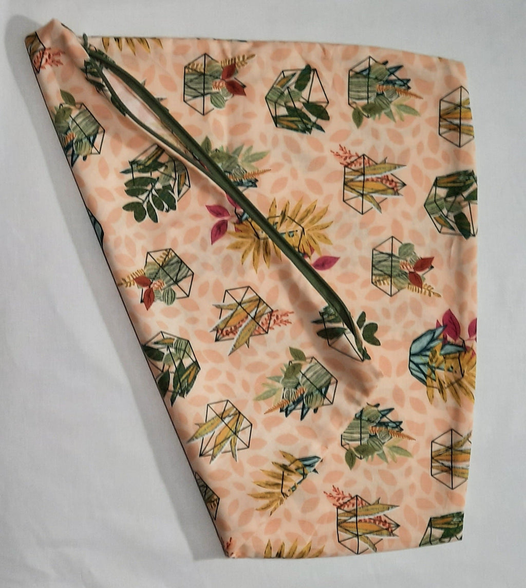 Beige, peach front and back. Catus and flowers. Size: 18"x18"