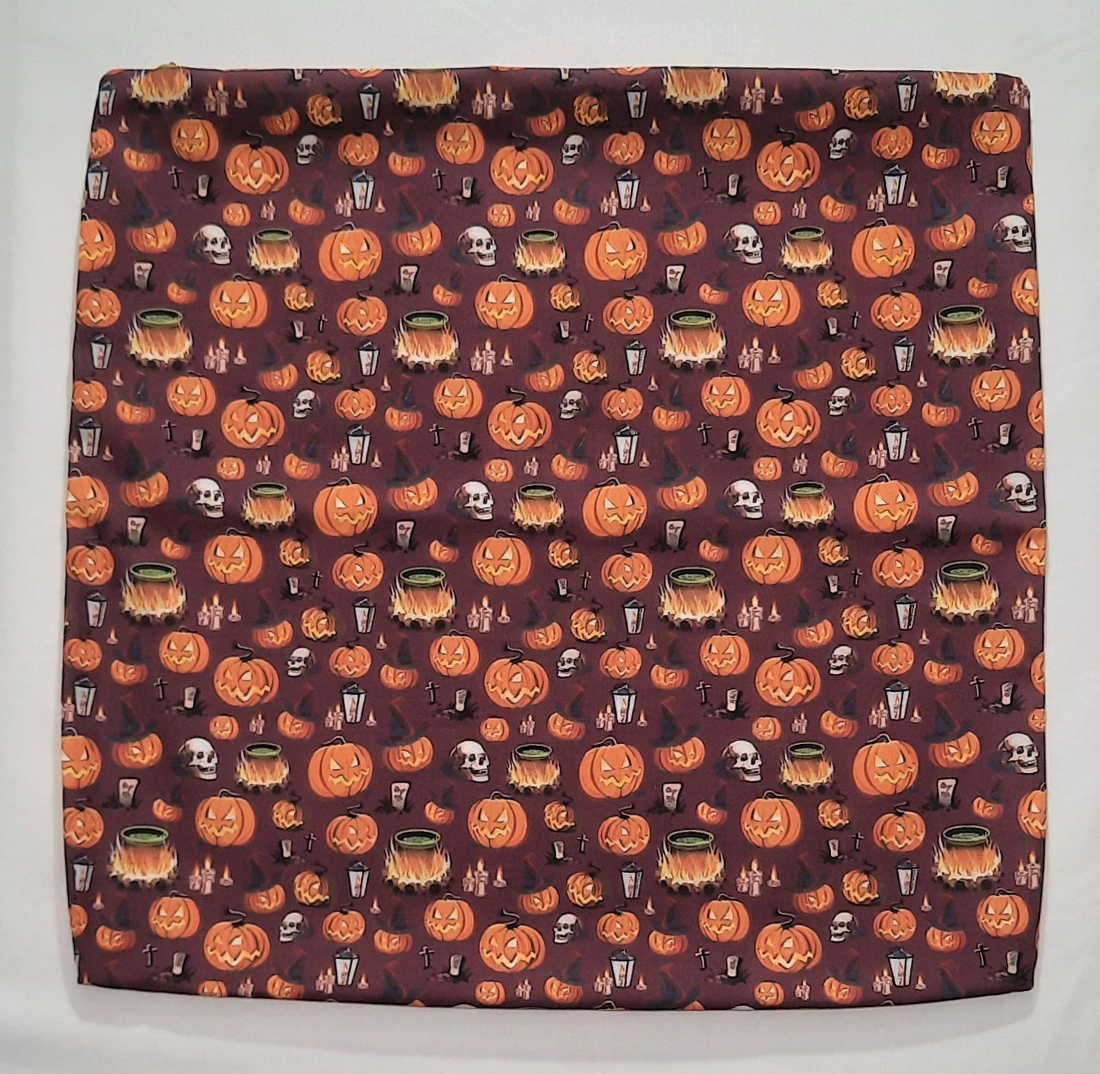 Pumpkin and skulls Halloween pattern front and back. Size: 18"x18"