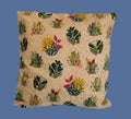 Beige, peach front and back. Catus and flowers. Size: 18"x18"