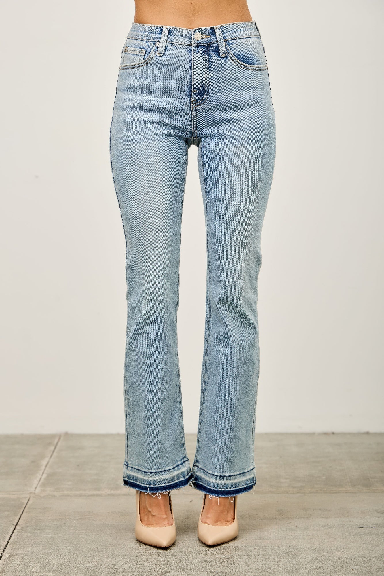 Mid Rise Flare With Released Hem