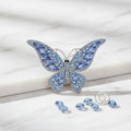 Silver Butterfly Brooch with Light Blue Stone – Stylish Statement Jewelry Accessory