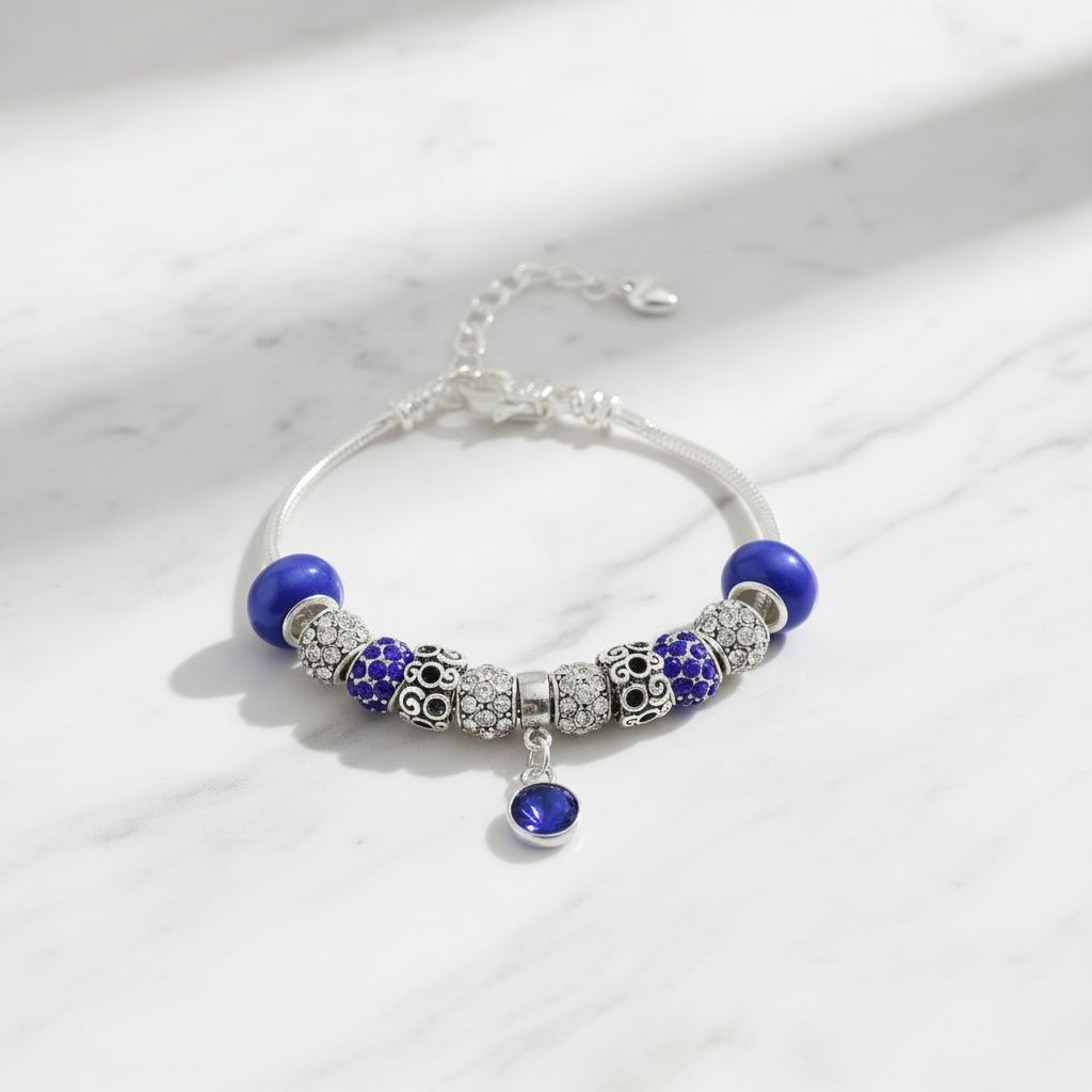 Women's Silver Snake Chain Bracelet with Blue Charm Stylish Jewelry Accessory
